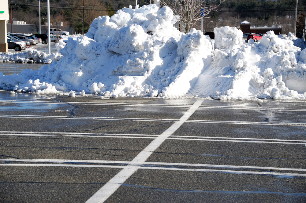 Most commercial and residential property owners in cold climates face the challenge of preparing their asphalt parking lots for winter. Snow and ice can often